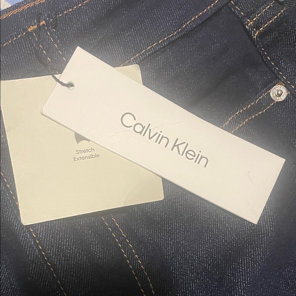 Calvin Klein High Rise Flared Jeans - Picture 5 of 7
